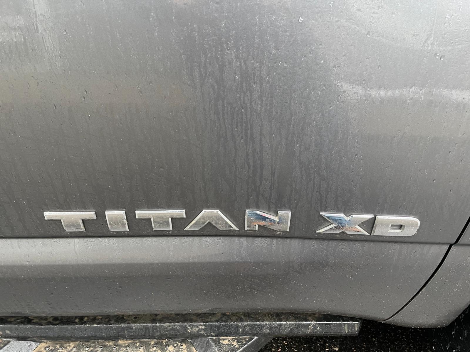2017 Silver /Black Nissan Titan XD SV 4WD Diesel (1N6BA1F33HN) with an 5.0L V8 DOHC 32V DIESEL engine, 6A transmission, located at 11115 Chardon Rd. , Chardon, OH, 44024, (440) 214-9705, 41.580246, -81.241943 - This 2017 Nissan Titan XD SV Crew Cab featuring the 5.0 Cummins V8 diesel engine and a 6-speed Aisin transmission is a robust full-size pickup truck designed for heavy-duty tasks. As a one-owner vehicle, it suggests a potentially well-maintained history, and with a significant towing capacity of 12, - Photo #6